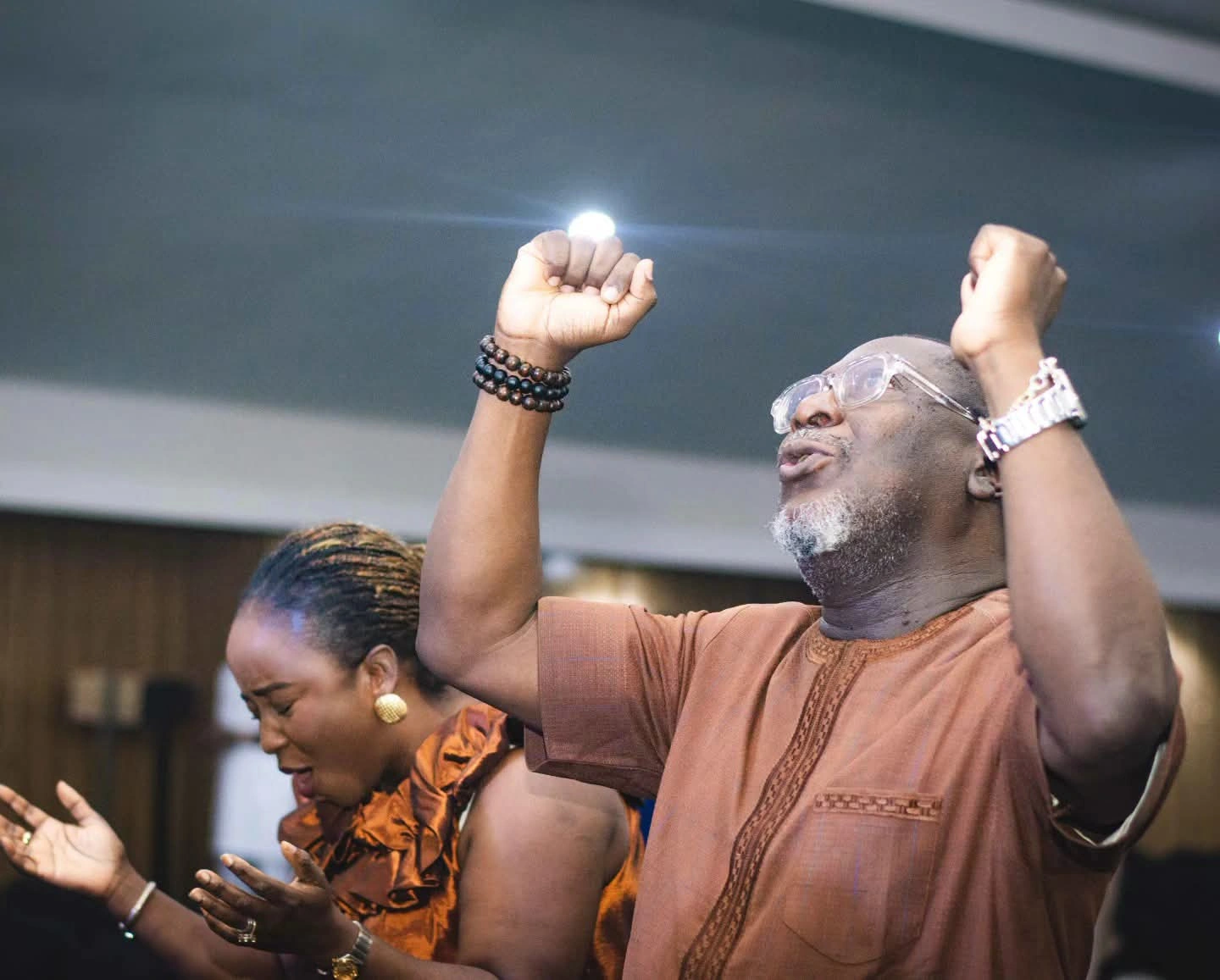 Believers wearing the Jerusalem Bracelet in worship